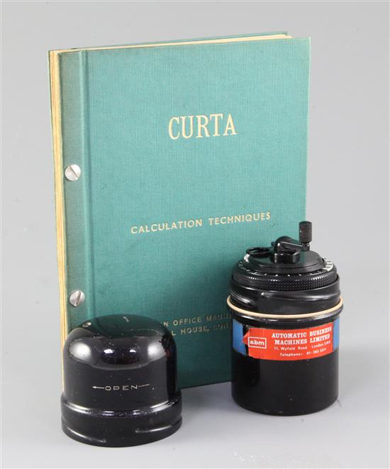 A Contina Ltd Curta Mechanical Calculator, calculator height 4.5in.